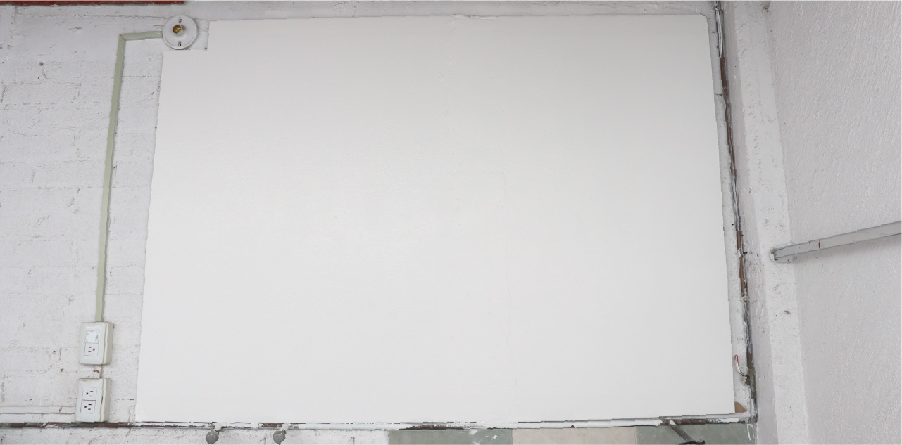 Imagen final del tablero de yeso pegado con adhesivo para paneles de construcción Niasa